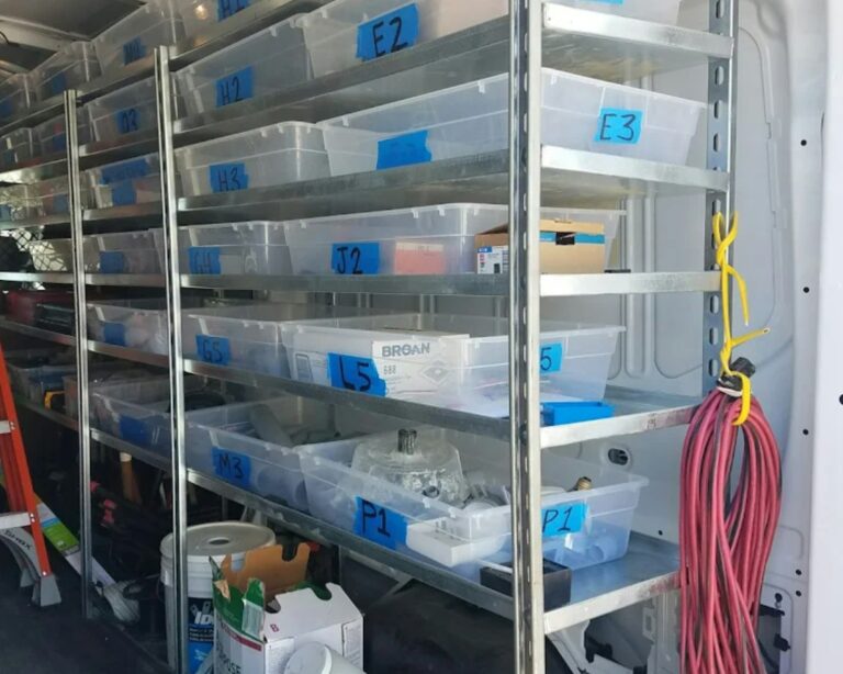 Shelves of labelled bins holding medical supplies
