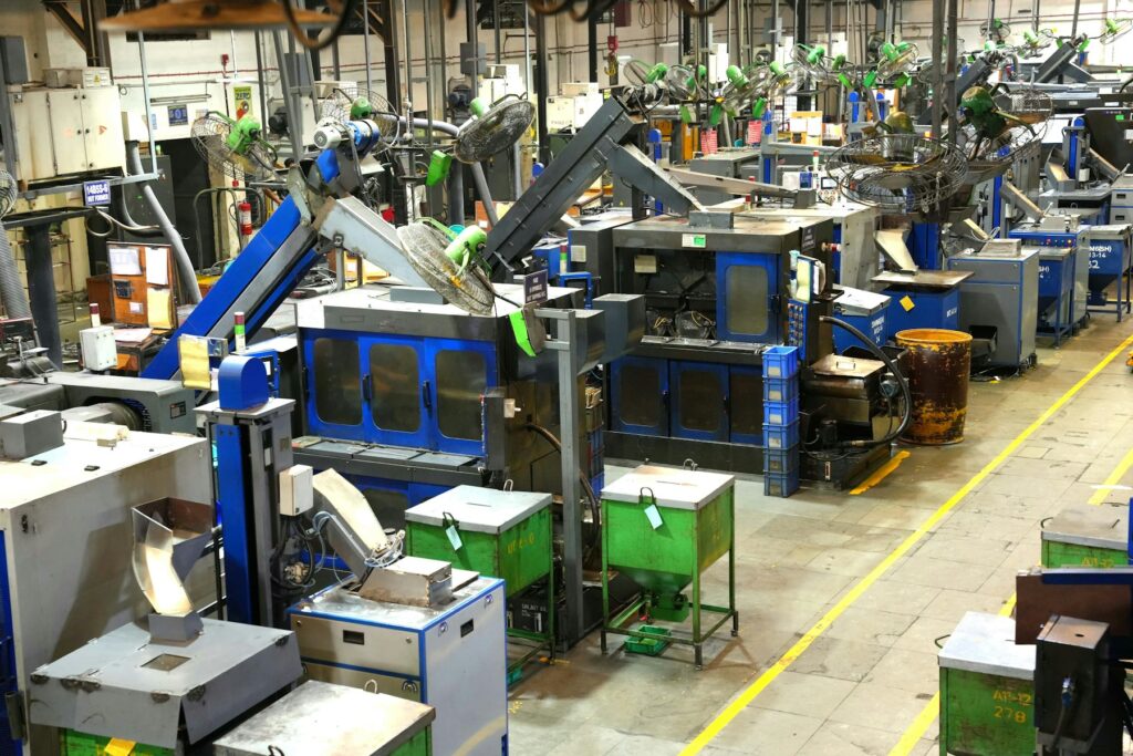 Industrial factory floor with machinery and yellow safety lines