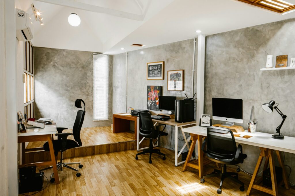 Modern open office with desks and computers